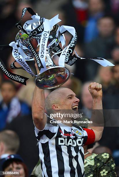 Jim Goodwin of St Mirren celebrates with the Scottish Communities League Cup after victory in the Scottish Communities League Cup Final between St...