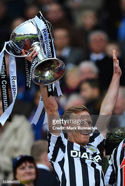 Gary Teale of St Mirren celebrates with the Scottish Communities League Cup after victory in the Scottish Communities League Cup Final between St...