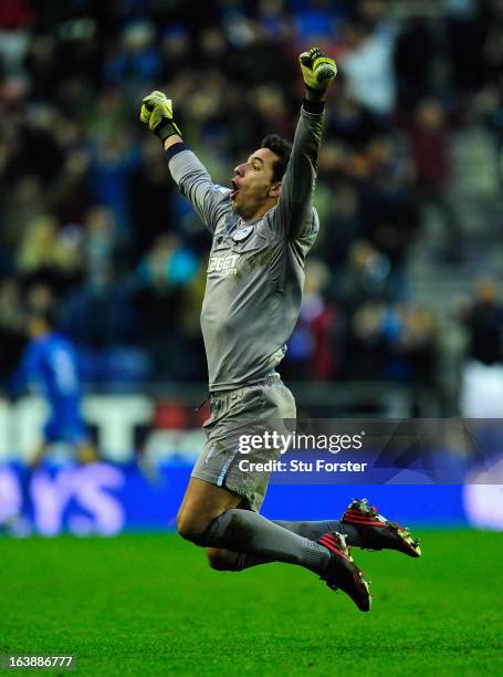 Wigan keeper Joel Robles celebrates the winning goal during the Barclays Premier League match between Wigan Athletic and Newcastle United at DW...