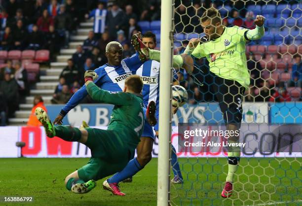 Arouna Kone of Wigan Athletic scores the winning goal during the Barclays Premier League match between Wigan Athletic and Newcastle United at the DW...