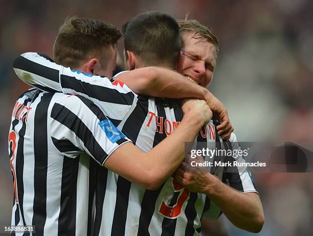 Mark McAusland and Steven Thompson of St Mirren celebrates after his side triumphs in the Scottish Communities League Cup Final between St Mirren and...