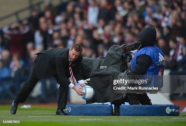 Hearts manager Gary Locke urges his team on during the Scottish Communities League Cup Final between St Mirren and Hearts at Hampden Park on March...