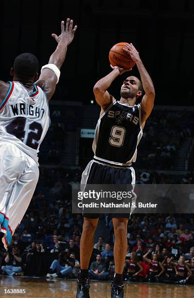 Tony Parker of the San Antonio Spurs goes up for the jump shot over Lorenzen Wright of the Memphis Grizzlies during the game at The Pyramid on...