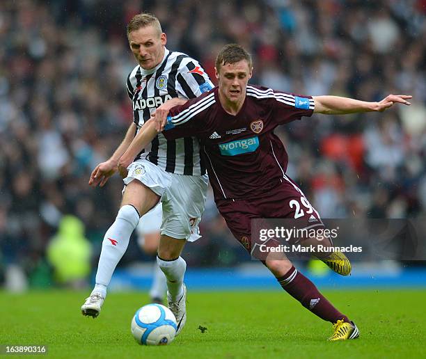 Gary Teale of St Mirren and Kevin McHattie of Hearts during the Scottish Communities League Cup Final between St Mirren and Hearts at Hampden Park on...