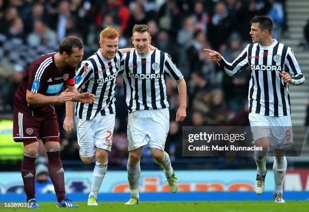 Conner Newton, Paul Dummet and Steven Thomson of St Mirren celebrate Conner Newtons winning goal in the Scottish Communities League Cup Final between...