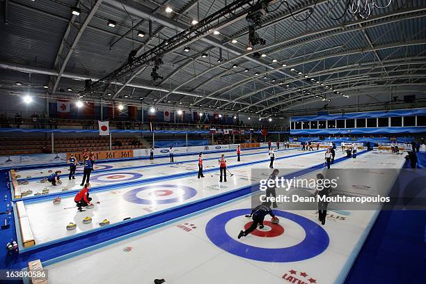 General view of the venue as Satsuki Fujisawa of Japan throws the stone in the match between Japan and Latvia in the closest area of play during Day...