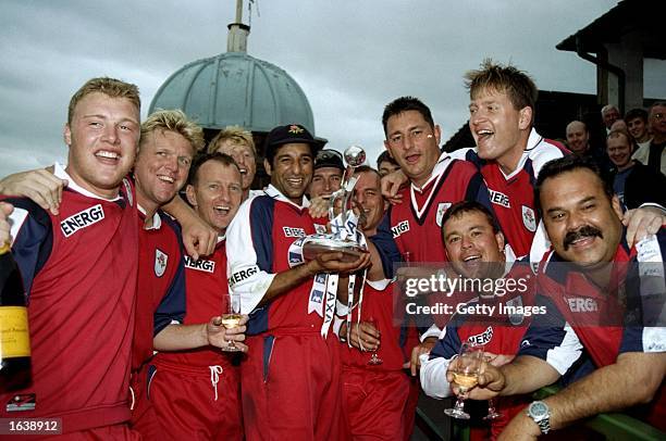 The winning Lancashire team after beating Hampshire in the 1998 AXA Cricket Sunday League played at Old Trafford, Manchester, England. Lancashire won...