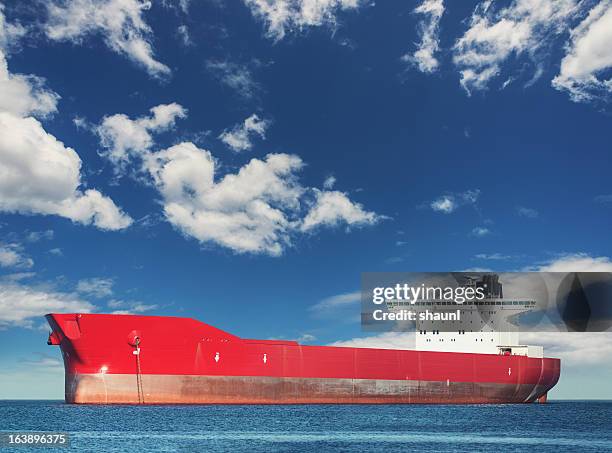 anchored oil tanker - oil tanker stock pictures, royalty-free photos & images