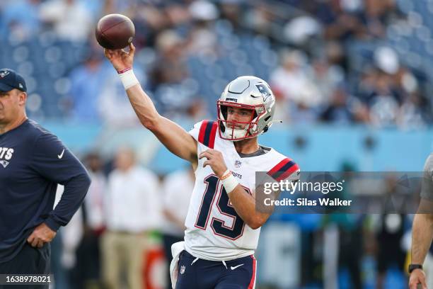 Trace McSorley of the New England Patriots warms up before facing the Tennessee Titans during a preseason game at Nissan Stadium on August 25, 2023...