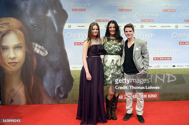 Director Katja von Garnier poses with Actress Hanna Binke and Actor Marvin Linke on the red carpet for the premiere of the film "Ostwind" on March...