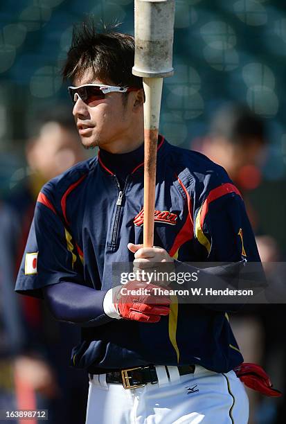 Takashi Toritani of Team Japan looks on during batting practice before playing Team Puerto Rico in the Semifinal Game 1 of the World Baseball Classic...