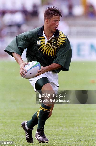 Bobby Skinstad of South Africa in action during the Rugby Sevens Tournament at the Commonwealth Games against Papua New Guinea in Kuala Lumper,...