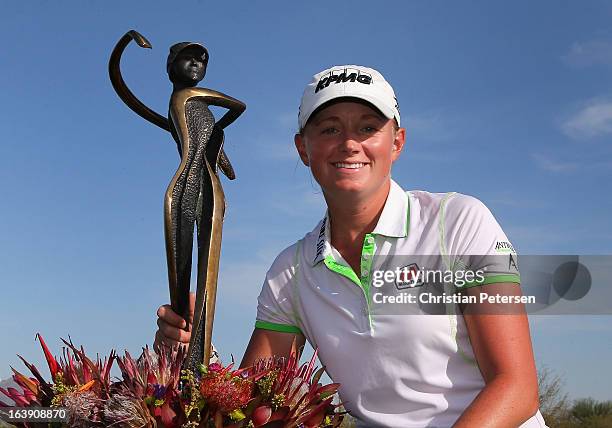 Stacy Lewis poses with the trophy after winning the the RR Donnelley LPGA Founders Cup and becoming number 1 in the World Golf Ranking at Wildfire...