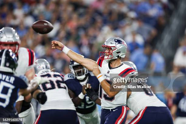 Trace McSorley of the New England Patriots throws a pass against the Tennessee Titans during the preseason game at Nissan Stadium on August 25, 2023...