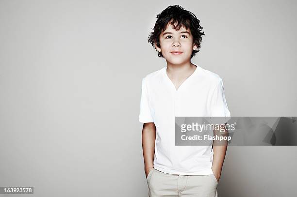 studio portrait of boy - three quarter length stock pictures, royalty-free photos & images