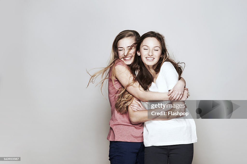 Studio portrait of two women who are best friends
