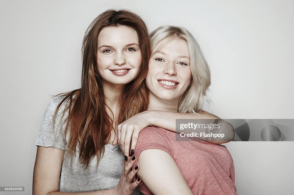 Studio portrait of two women who are best friends