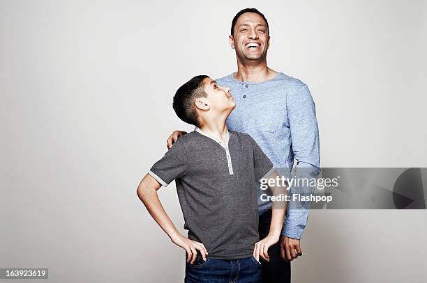 portrait of father and son - father standing stockfoto's en -beelden