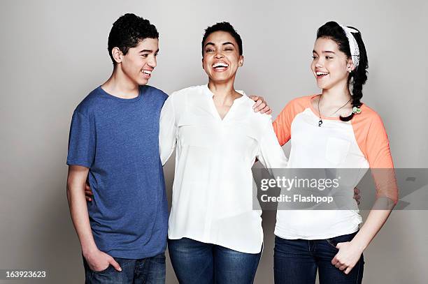 portrait of mother with son and daughter - adolescent daughter mother portrait stock-fotos und bilder