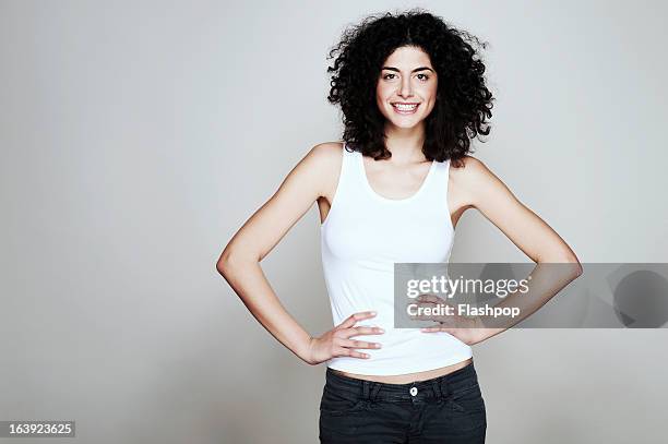 studio portrait of woman - tank top ストックフォトと画像