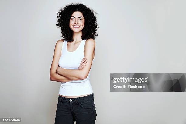 studio portrait of woman - camiseta de tirantes fotografías e imágenes de stock