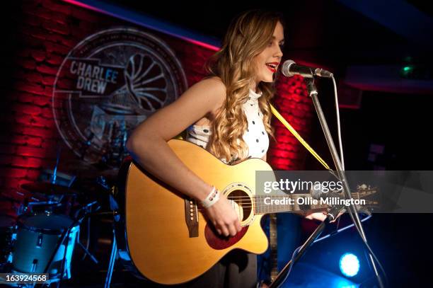 Izzy Marie Hill performs on stage at the Crumblin' Cookie supporting Charlie Drew on March 2, 2013 in Leicester, England.