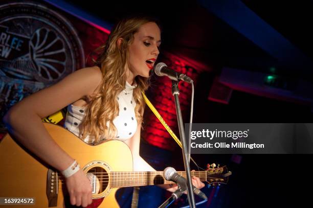 Izzy Marie Hill performs on stage at the Crumblin' Cookie supporting Charlie Drew on March 2, 2013 in Leicester, England.