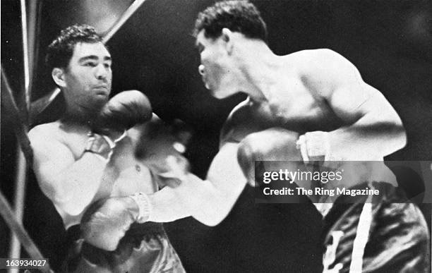 Joe Frazier lands a punch against Max Schmeling during the fight at Yankee Stadium in Bronx,New York. Joe Louis won by a KO 1.