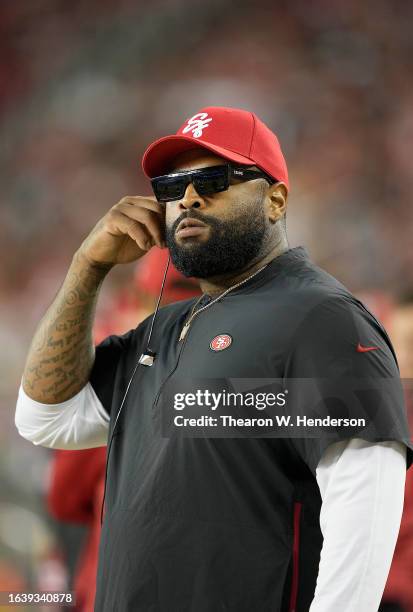 Trent Williams of the San Francisco 49ers looks on from the sidelines against the Los Angeles Chargers during the second quarter of a preseason game...