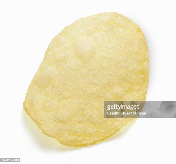 potatoe chip on white background - potato chip stock pictures, royalty-free photos & images