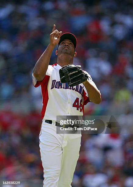 Jose Veras of Team Dominican Republic reacts to pitching a scoreless inning during Pool 2, Game 6 against Team Puerto Rico in the second round of the...