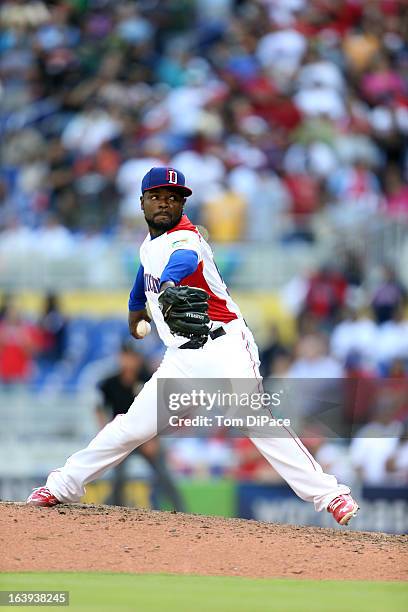 Fernando Rodney of Team Dominican Republic pitches during Pool 2, Game 6 against Team Puerto Rico in the second round of the 2013 World Baseball...