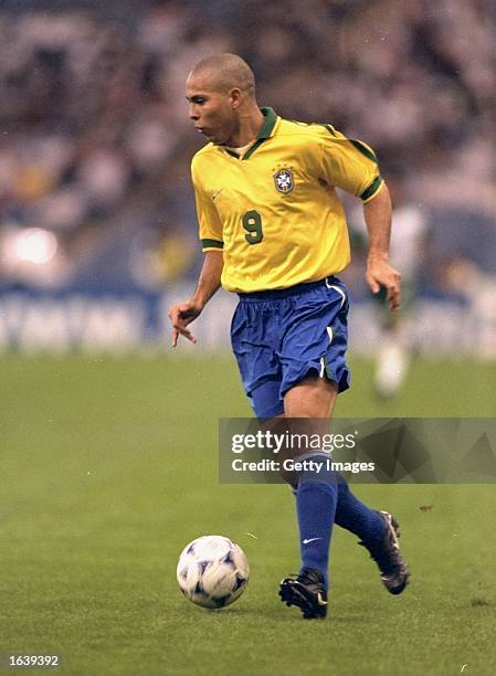 Ronaldo of Brazil in action during the Confederation Cup match against Saudia Arabia at the King Fahd Stadium in Riyadh, Saudi Arabia. Brazil won the...