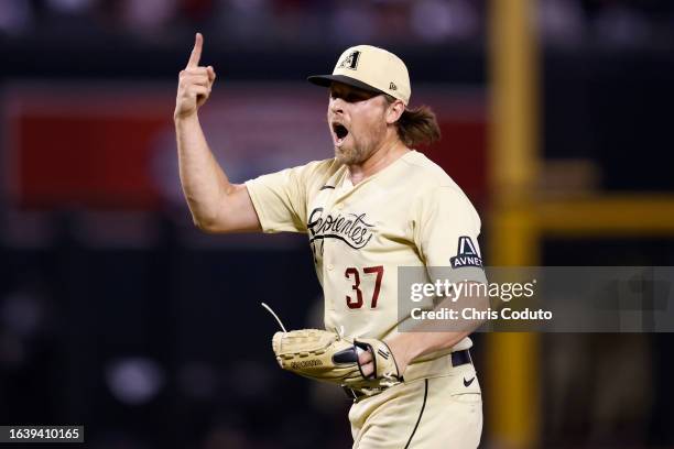 Kevin Ginkel of the Arizona Diamondbacks reacts after the Diamondbacks defeated the Cincinnati Reds 10-8 at Chase Field on August 25, 2023 in...