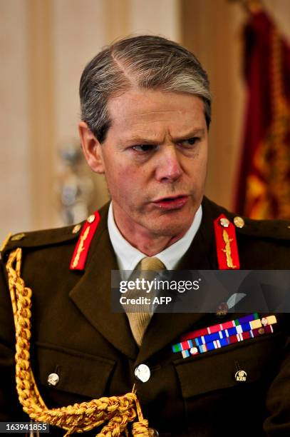 British Commander Land Forces Lieutenant General Adrian Bradshaw speaks at a press conference at Buller Barracks, in Aldershot, Hampshire on March...