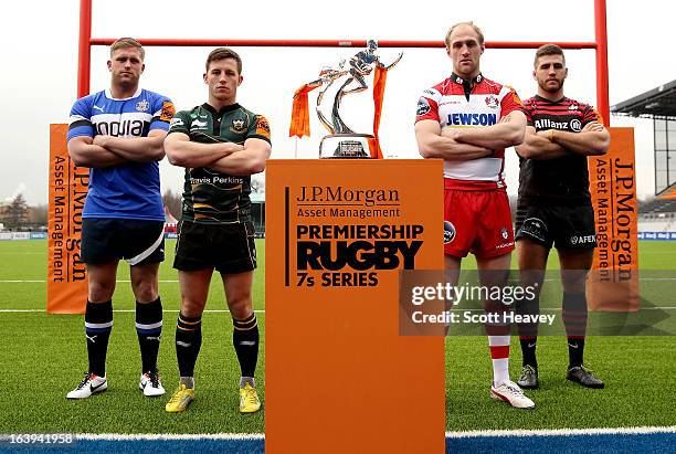 Ben Williams of Bath, Josh Shipley of Northampton, Olly Morgan of Gloucetser, and Will Fraser of Saracens pose with the trophy during the launch of...
