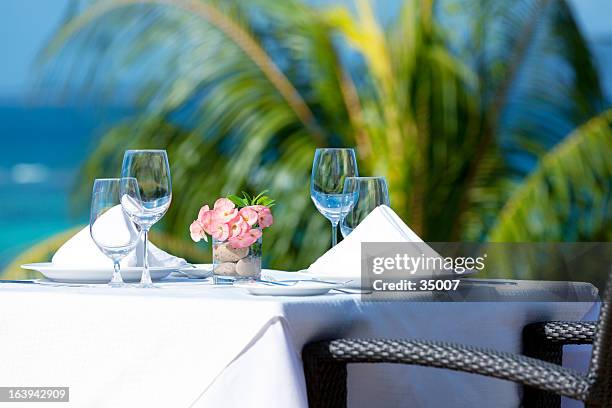 tropical fine dining table setting - waterfront stock pictures, royalty-free photos & images