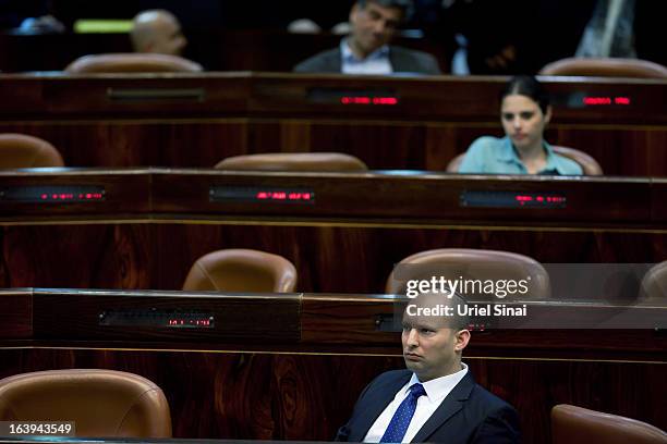 Naftali Bennett, head of Israel's Jewish Home party looks on before the swearing in of the new Israeli government at the Knesset on March 18, 2013 in...