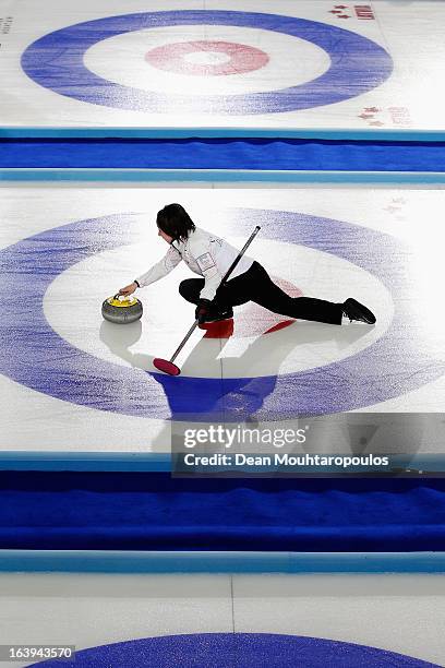 Satsuki Fujisawa of Japan throws the stone in the match between Japan and Germany during Day 3 of the Titlis Glacier Mountain World Women's Curling...