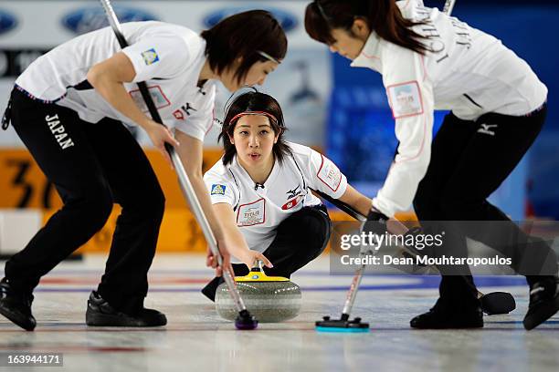 Emi Shimizu of Japan looks on after she throws the stone in the match between Japan and Germany during Day 3 of the Titlis Glacier Mountain World...