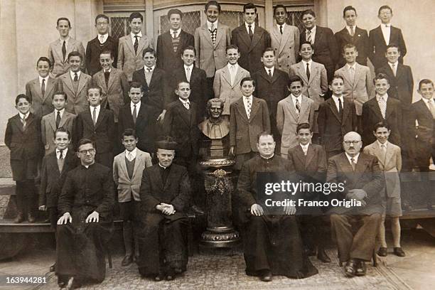 In this undated collect photograph courtesy of the Jesuit General Curia in Rome, a young Jorge Mario Bergoglio poses for a group picture at his...