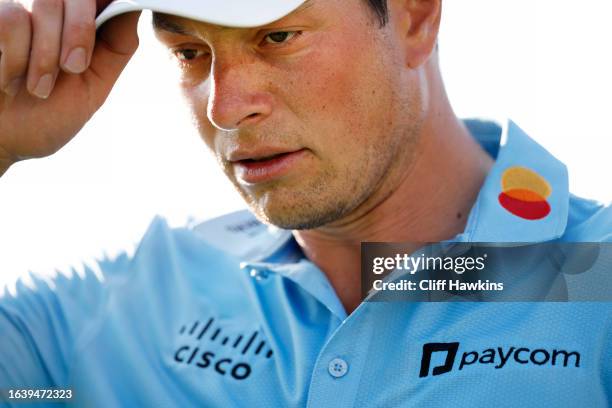 Viktor Hovland of Norway walks from the 18th green during the second round of the TOUR Championship at East Lake Golf Club on August 25, 2023 in...