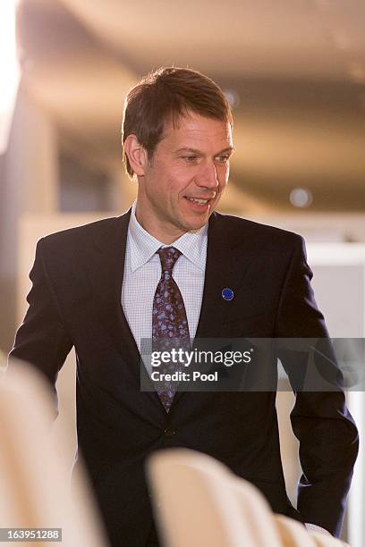 Rene Obermann, CEO of Deutsche Telekom AG attends a meeting of Government and business leaders at the federal chancellory on March 18, 2013 in...