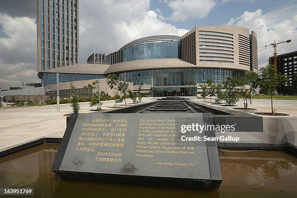 Plaque stands outside the headquarters complex of the African Union , which was a gift by the government of China and completed in 2012, on March 18,...