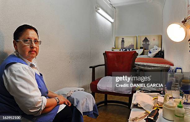 Mirta, the podiatrist of the hairdressing and pedicure salon Romano, founded in 1969, in downtown Buenos Aires, pictured on March 18, 2013. The salon...