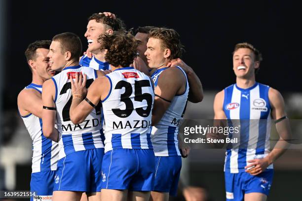 Nick Larkey of the Kangaroos celebrates a goal during the round 24 AFL match between North Melbourne Kangaroos and Gold Coast Suns at Blundstone...