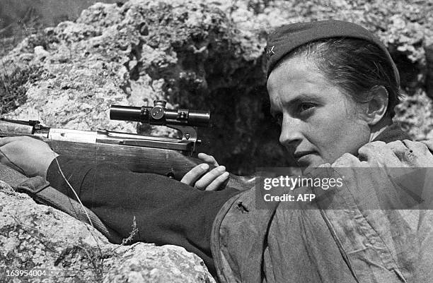 The Red Army Soviet sniper Lyudmila Pavlyuchenko defends Sevastopol from the Nazis, on June 06, 1942. Lyudmila Mykhailivna Pavlichenko was born in...