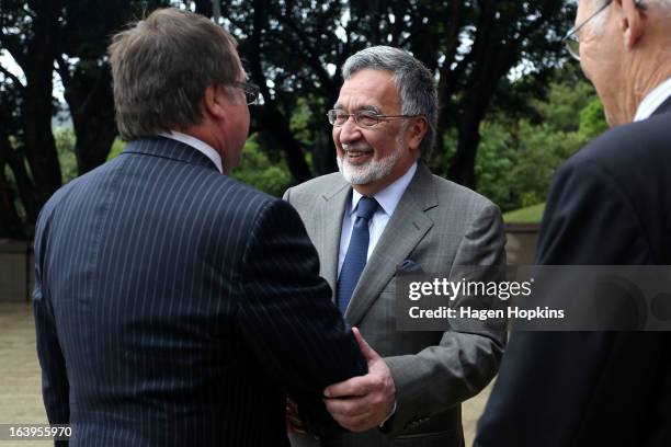 Afghan Foreign Minister Dr Zalmai Rassoul and New Zealand Foreign Affairs Minister Murray McCully shake hands during a wreath-laying ceremony to...