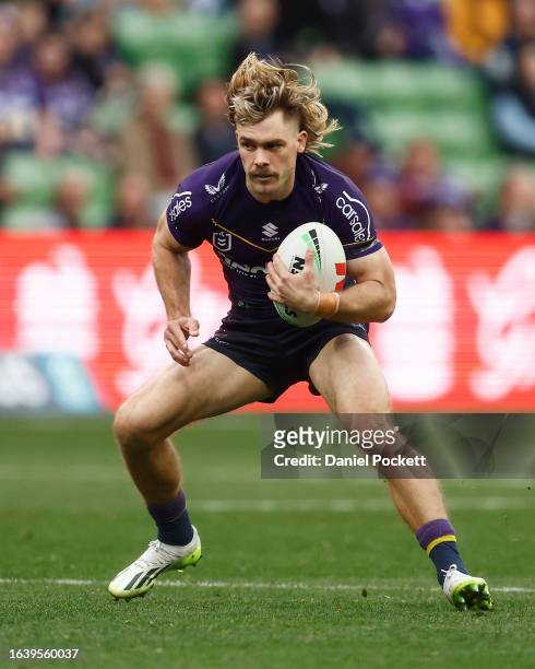 Ryan Papenhuyzen of the Storm runs with the ball during the round 26 NRL match between Melbourne Storm and Gold Coast Titans at AAMI Park on August...