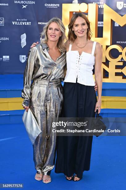 Karin Viard and Ana Girardot attend the 'Madame de Sevigne' Photocall during Day Four of the 16th Angouleme French-Speaking Film Festival on August...